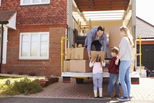 Packing and loading items for a local move in Merton