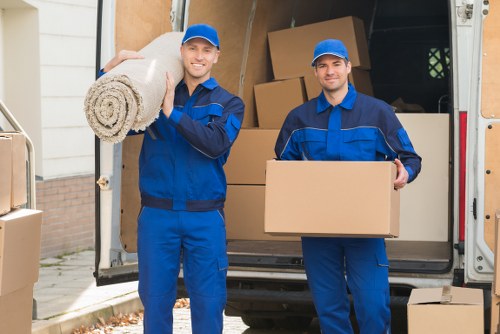 Furniture loading into a van for a Merton relocation