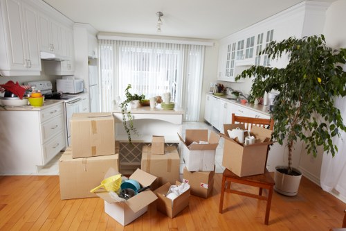 Unpacking boxes and organising a new home in Merton