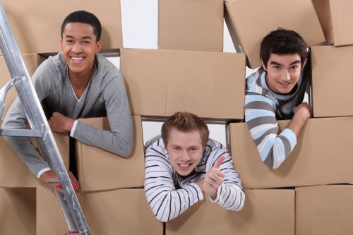 Furniture and boxes being arranged in a removal van