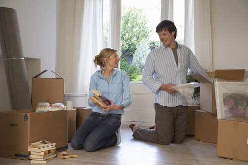 Packed boxes and furniture ready for a local move in Merton
