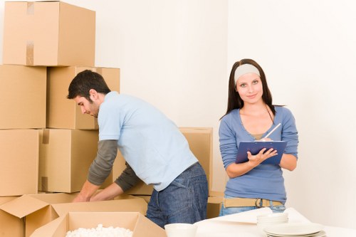 Local removal team loading office furniture for a business relocation